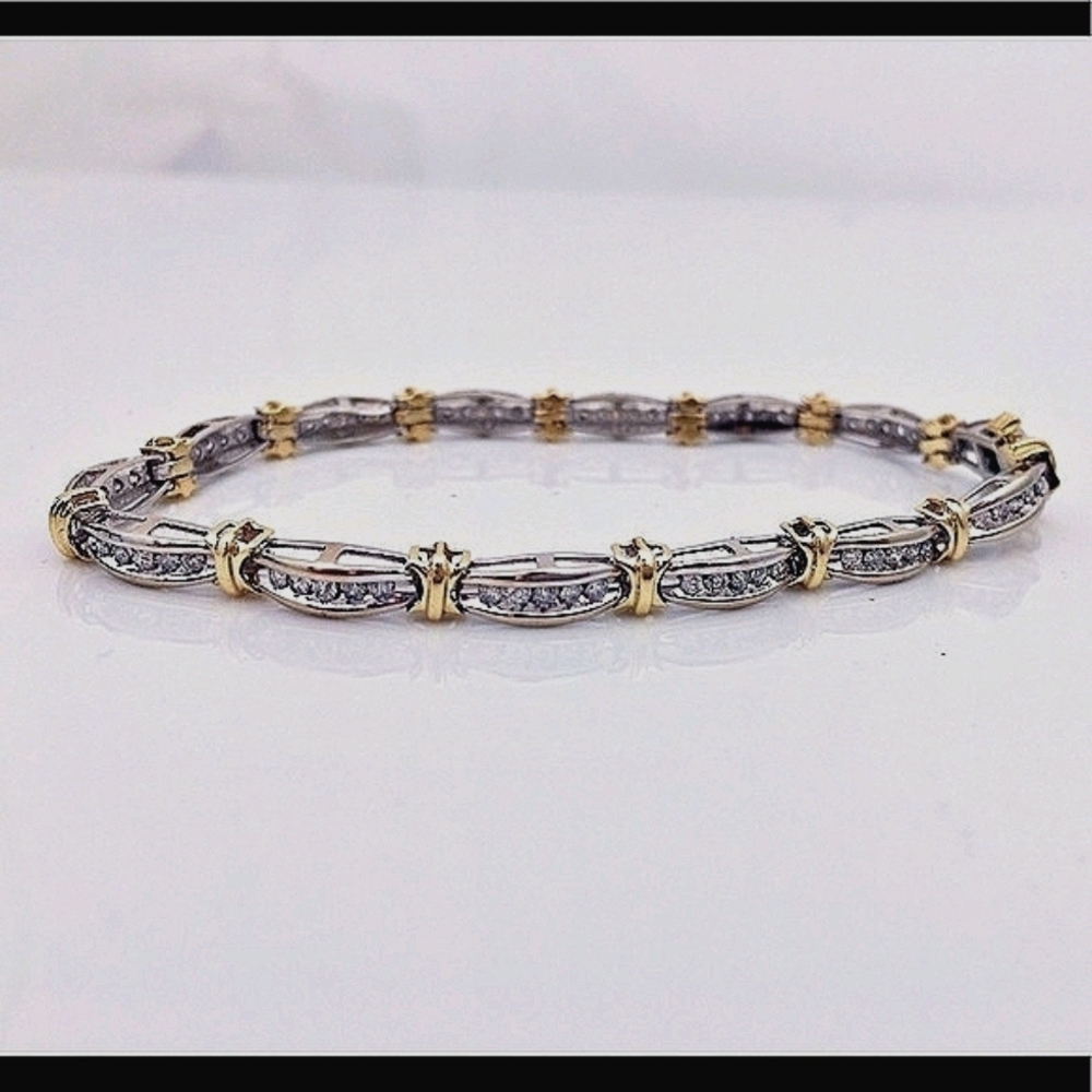 2.44 carat two toned gold and diamond tennis brace